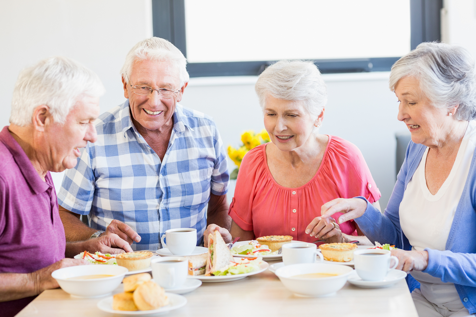 Take This Word Association Test and We’ll Reveal Whether You’re Old or Young at Heart Seniors having lunch together in a retirement home