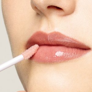 This Quiz Will Determine How Beauty Obsessed You Are Applying lip gloss