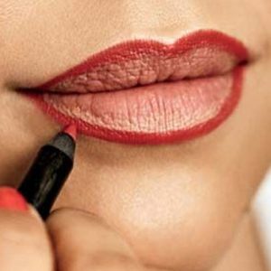 This Quiz Will Determine How Beauty Obsessed You Are Applying lip liner close to your actual lips