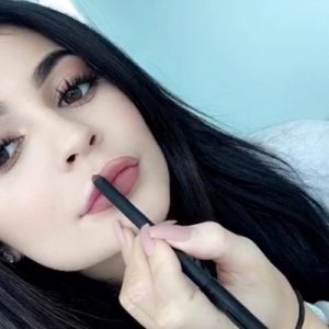 This Quiz Will Determine How Beauty Obsessed You Are Over-drawing your lips with a lip liner