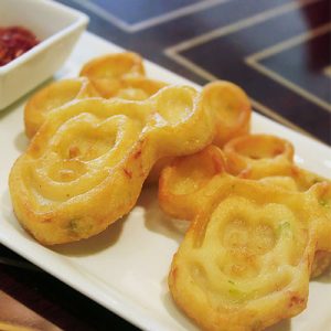 Eat Your Way Through Disney Parks and We’ll Guess How Old You Are Mickey’s Seafood Glutinous Pancake