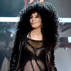 Can You Identify These Celebs from Their Iconic Outfits? Quiz Cher