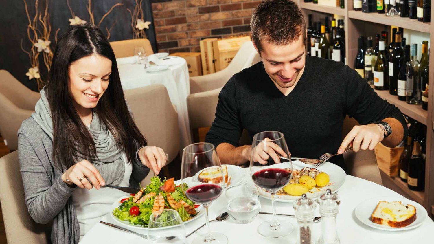 Plan a Perfect Date and We’ll Hook You up With a Hot Celeb Boyfriend! couple having dinner restaunt