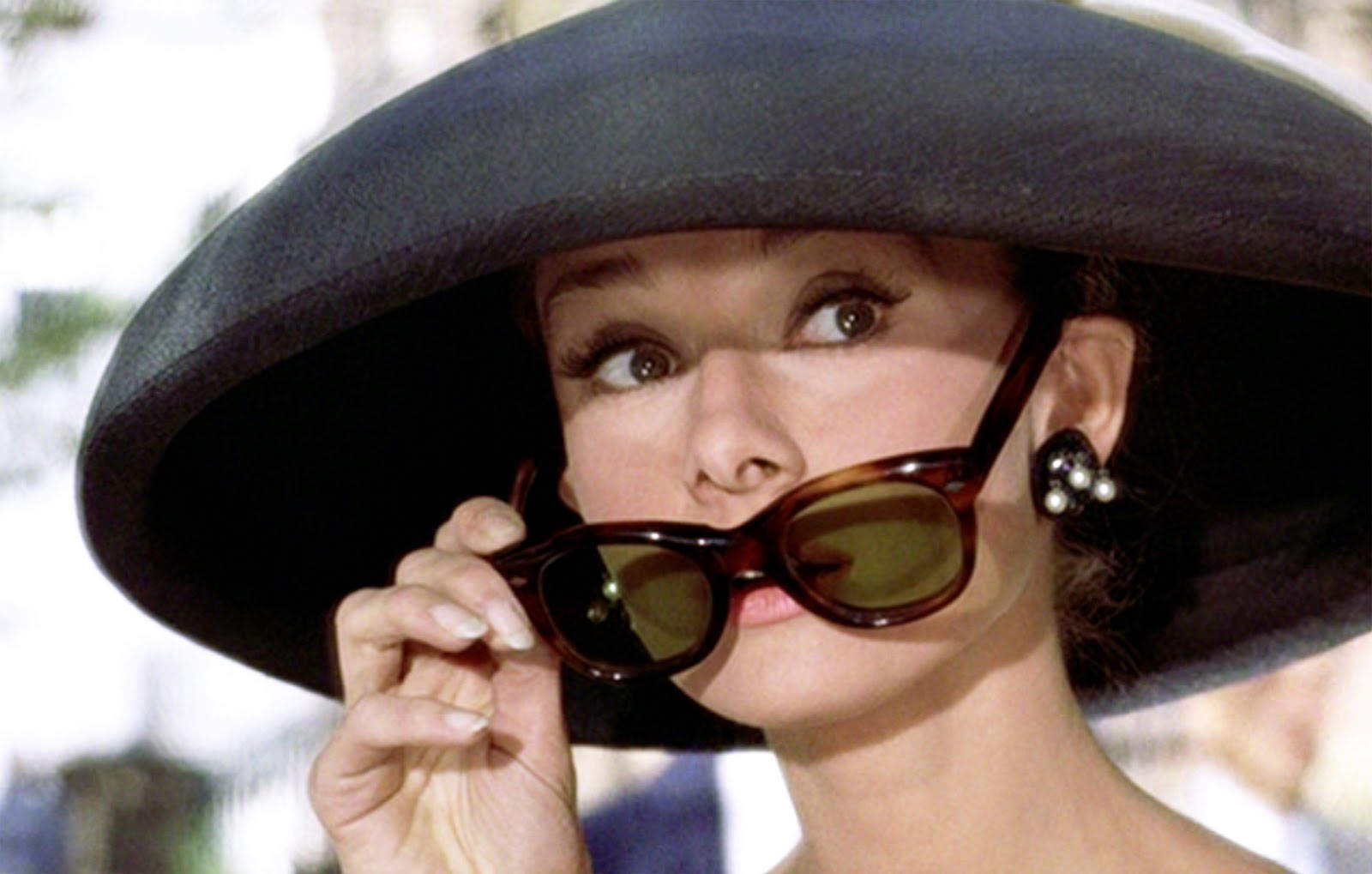 Which Iconic Female Character Are You? audrey hepburn sunglasses pulldown breakfast at tiffanys BIG