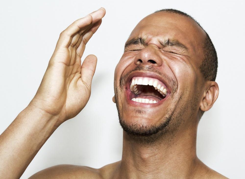 handsome guy laughing