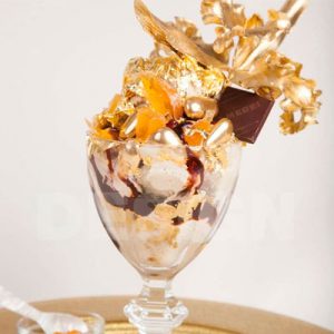 💸 Can You Waste $1 Billion In A Week? Quiz Sundae with caviar and gold leaves, served in a crystal goblet