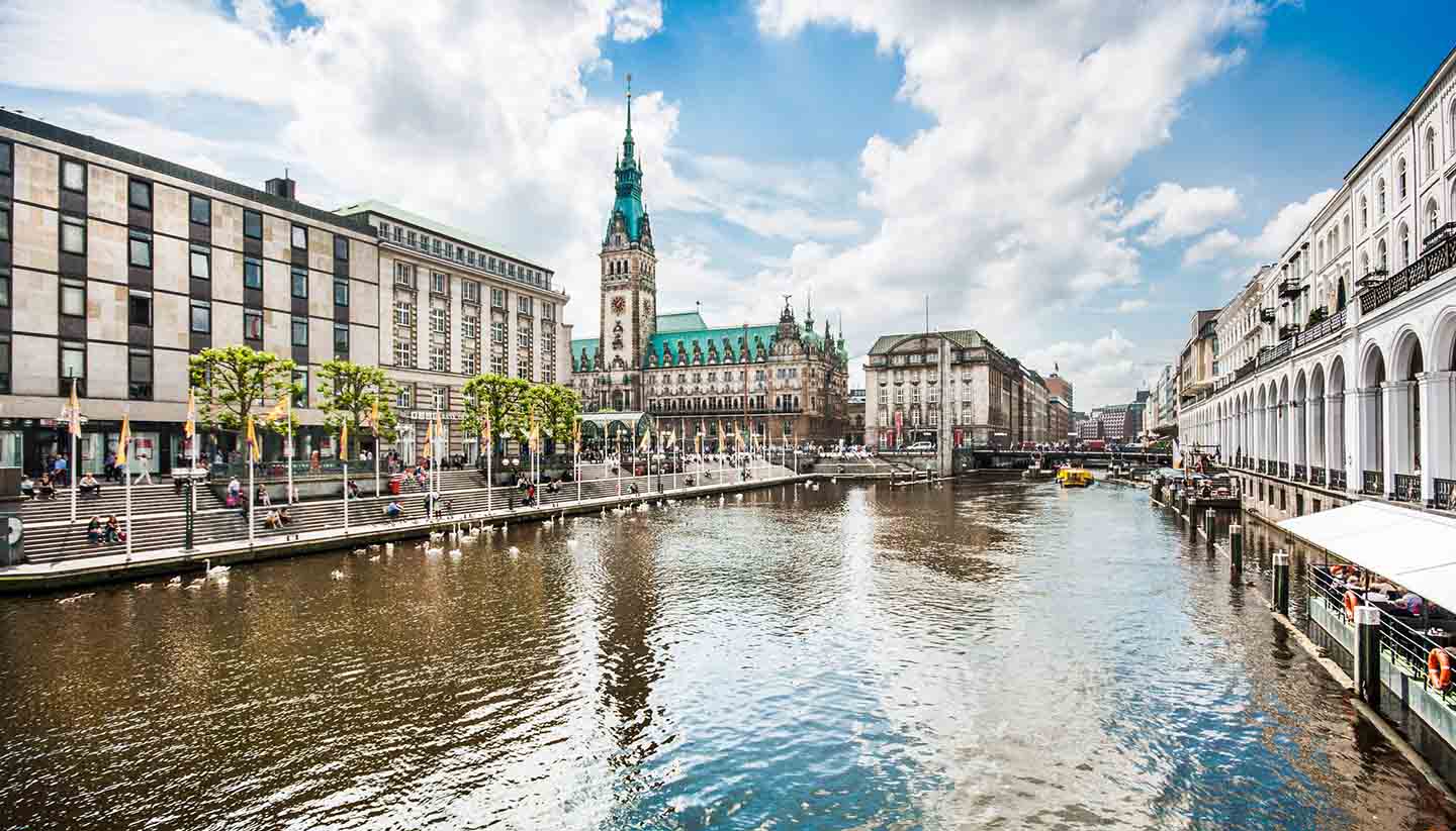 Can You Match These European Cities to Their Countries? Hamburg city center with town hall and Alster river, Germany