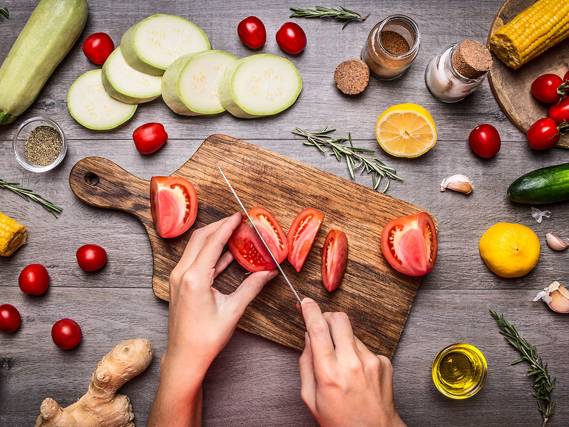 🥪 Your Stance on These Sandwich Toppings Will Reveal What Age You Will Live to Chopping cutting cooking tomatoes