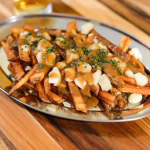 This Travel Quiz Is Scientifically Designed to Determine the Time Period You Belong in Poutine