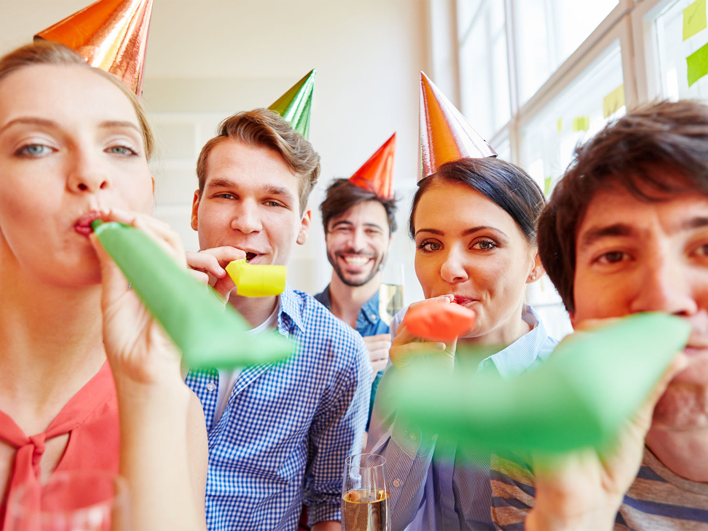 This Word Association Test Will Reveal If You're Living… Quiz 80690204   group of young people having fun with noisemakers in party