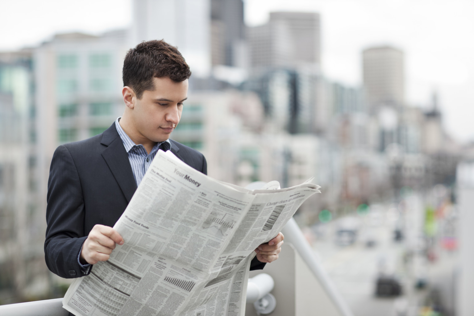 person reading newspaper