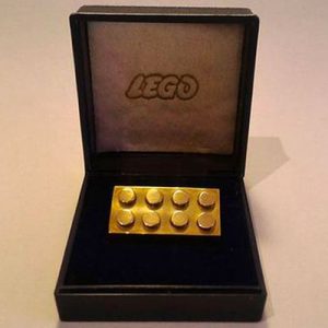 Buy Expensive Everyday Items and We’ll Reveal What Your Finances Look Like in 10 Years Gold LEGO block - $14,450