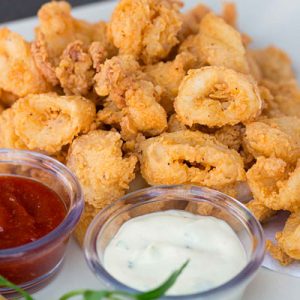 Order a Giant Meal from the Cheesecake Factory and We’ll Reveal How Old You REALLY Act Fried calamari