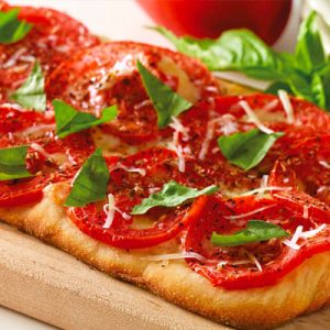 Order a Giant Meal from the Cheesecake Factory and We’ll Reveal How Old You REALLY Act Fresh basil, tomato, and cheese flatbread