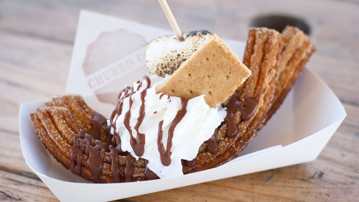 🎡 Eat Your Way Through a Carnival and We’ll Guess Your Birth Order 8 churros with ice cream