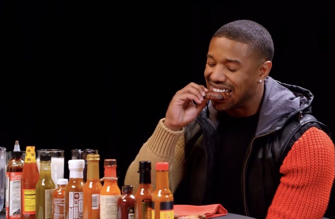 Hot Ones eating chicken wings