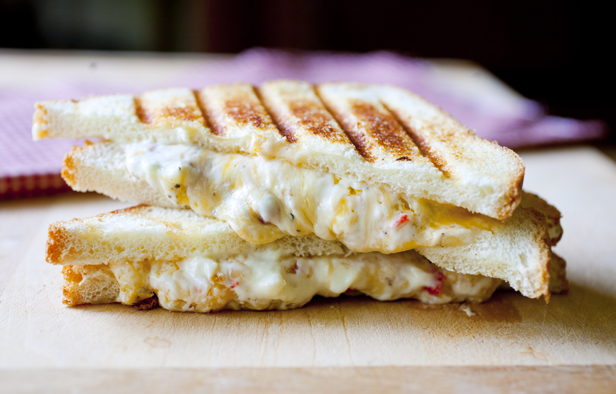 The Way You Eat Common Foods Will Reveal Whether You’re Shy or Outgoing cheese sandwich