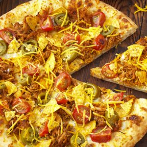 🍔 Plan a Dinner Party With Only Fast Food and We’ll Reveal Your Exact Age Taco Pizza from Pizza Hut