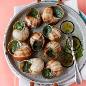 Eat Your Way Through Europe and We’ll Reveal What City You Belong in Buttered escargot