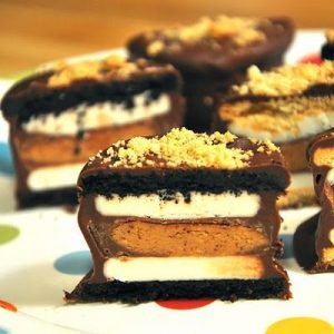 🍰 Your Dessert Choices Will Reveal Which Decade You Actually Belong in Chocolate-dipped peanut butter cup-stuffed Oreos