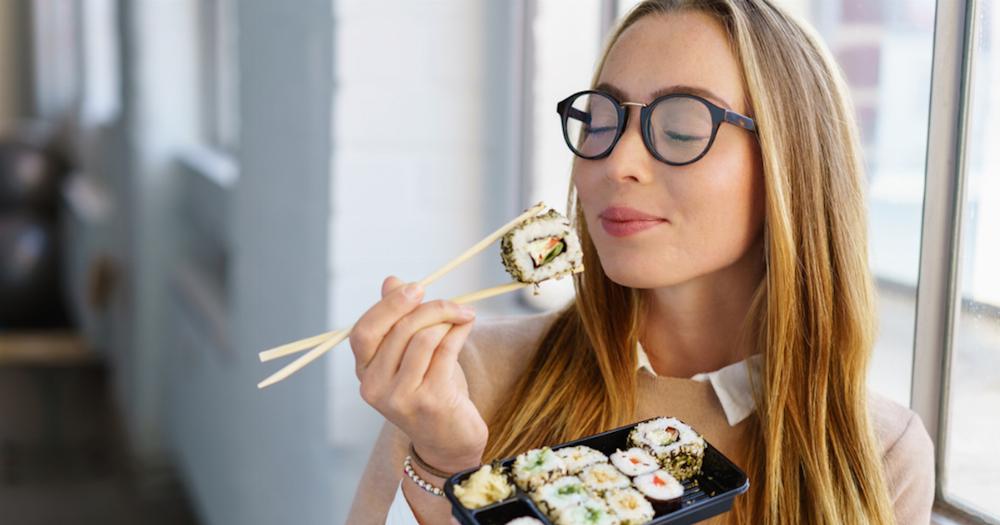 Sushi Trivia Quiz person eating sushi