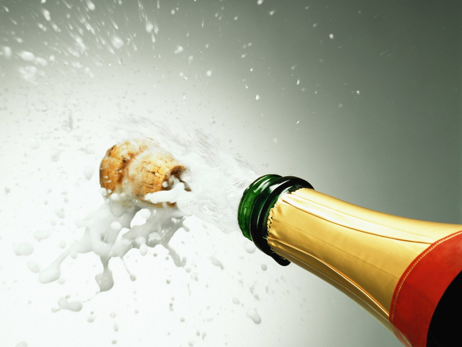 Can We Guess Your Age Based on the Life Skills You Have? popping champagne bottle