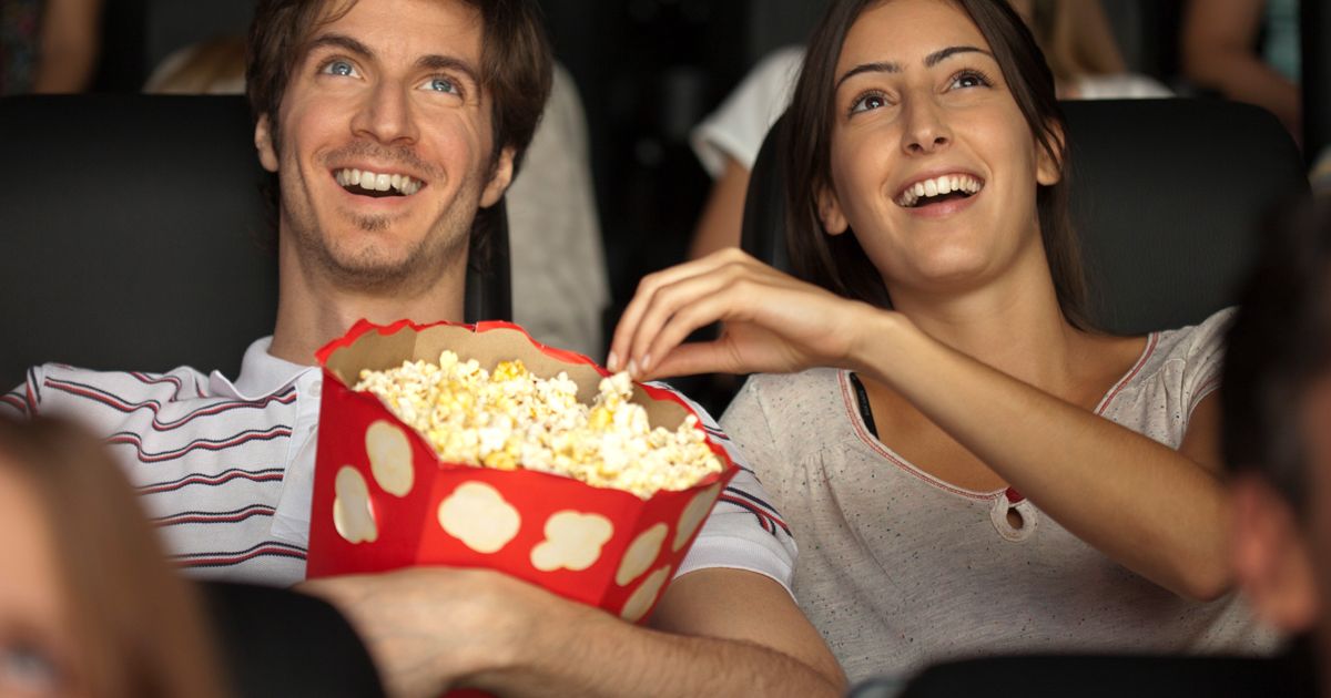 Are You More Logical or Emotional? person eating popcorn in cinema