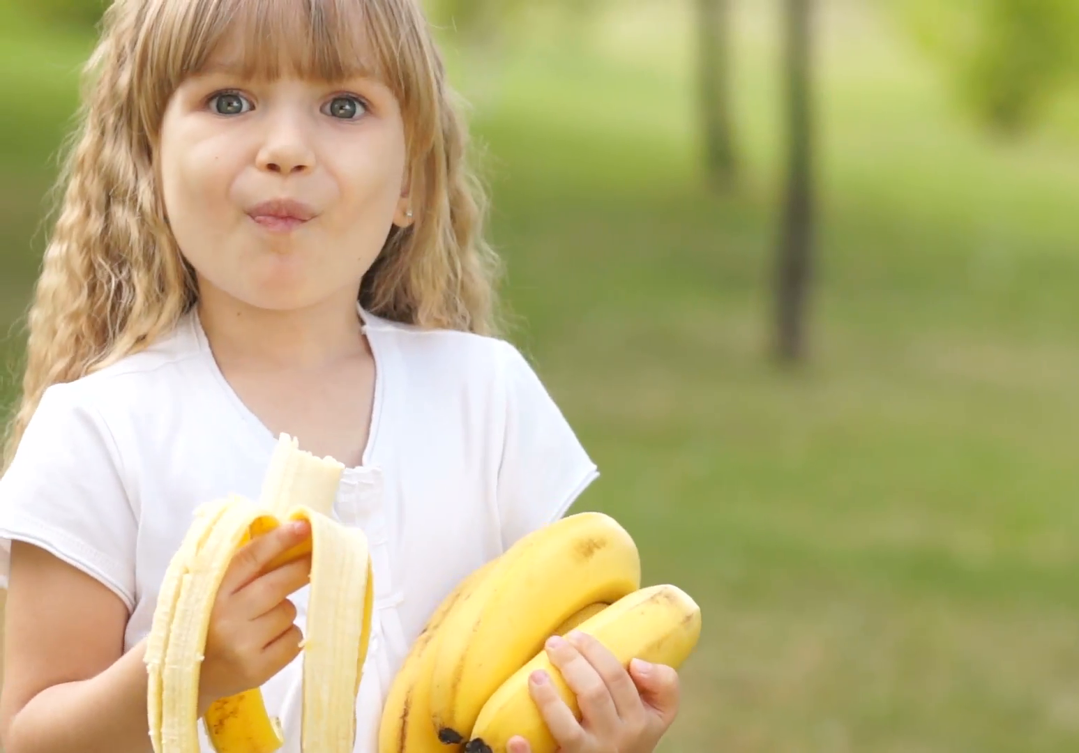 person eating banana