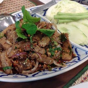 Can We Guess Your Age and Dream Job Based on What Thai Food You Order? Pork strips spicy salad