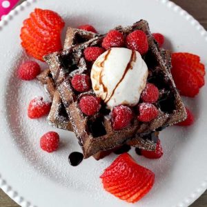 Pretend to Order an Expensive Brunch and We’ll Reveal Whether You’re More Millionaire or Billionaire Material Double chocolate waffles with berry sauce