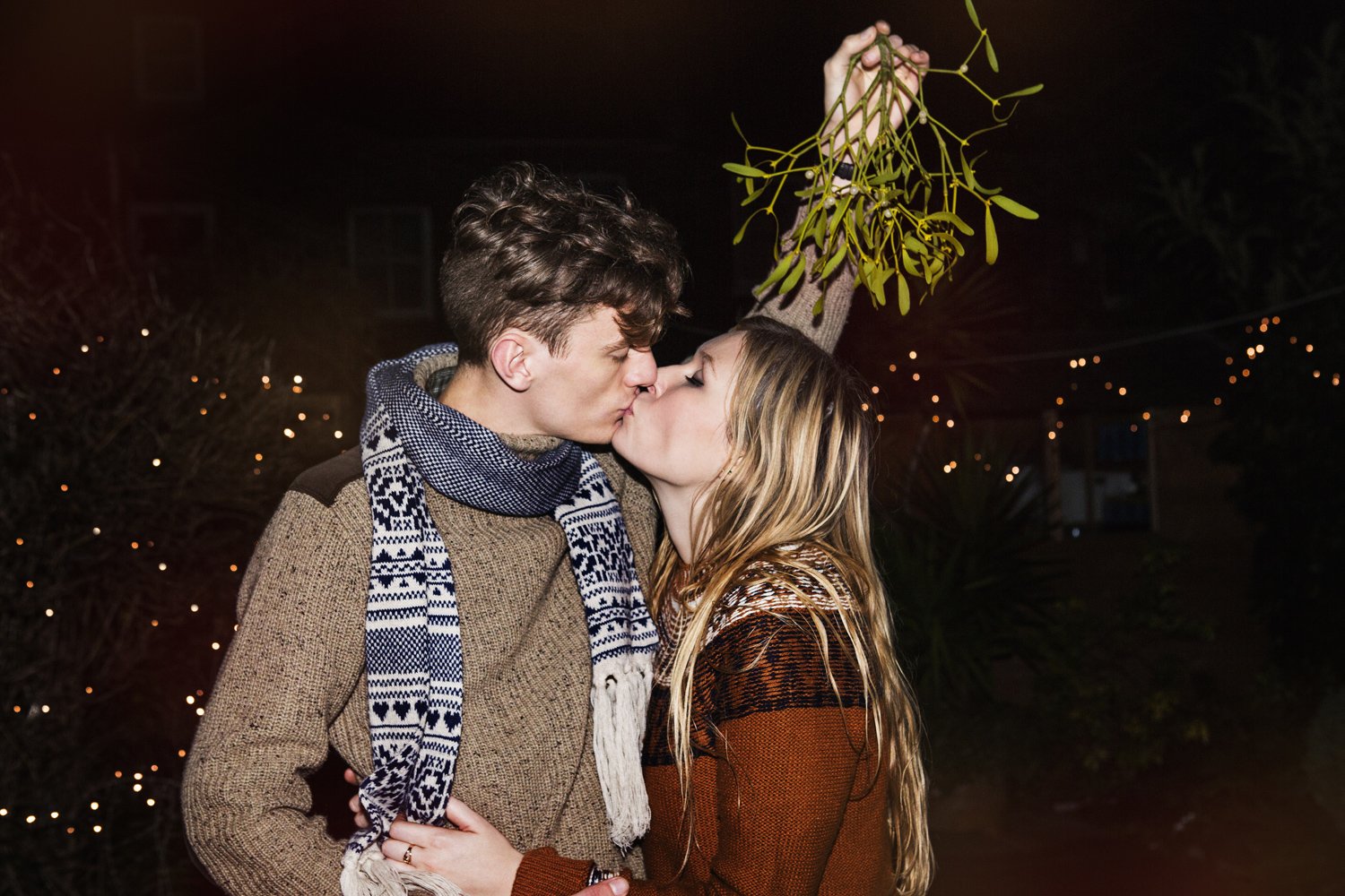 kissing under the mistletoe