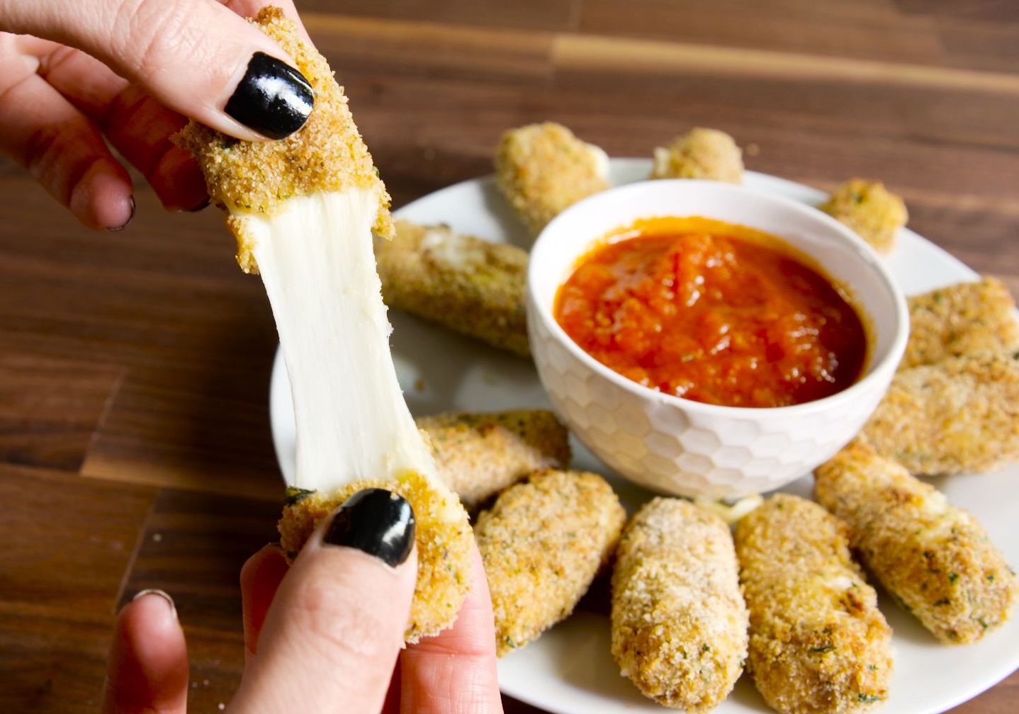 🍪 We Know Whether You’re in Your 20s or 30s Based on Your Snack Preferences stretchy mozzarella stick