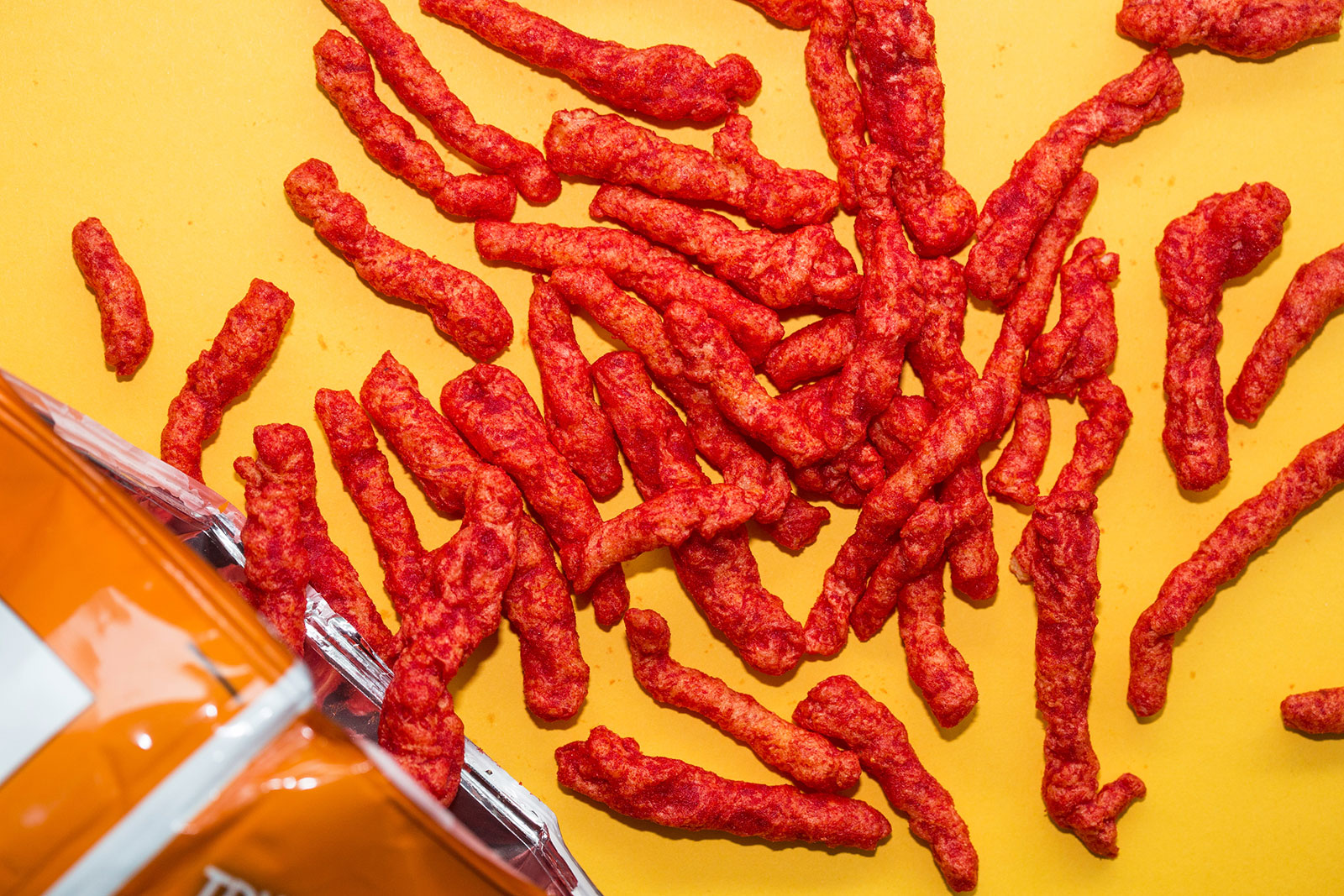 Have a Snacks Party by Yourself and We’ll Guess If You’re a Cat or Dog Person Flamin' Hot Cheetos