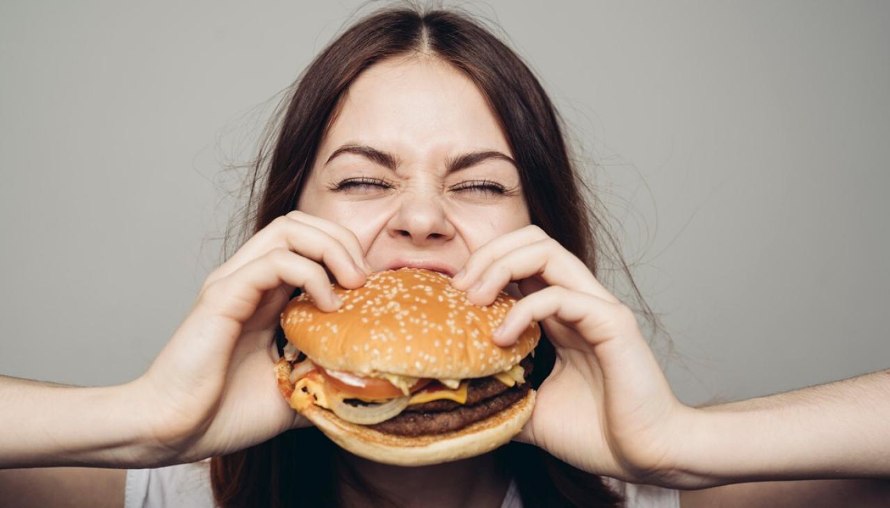 Woman Eating Mcdonald's Burger