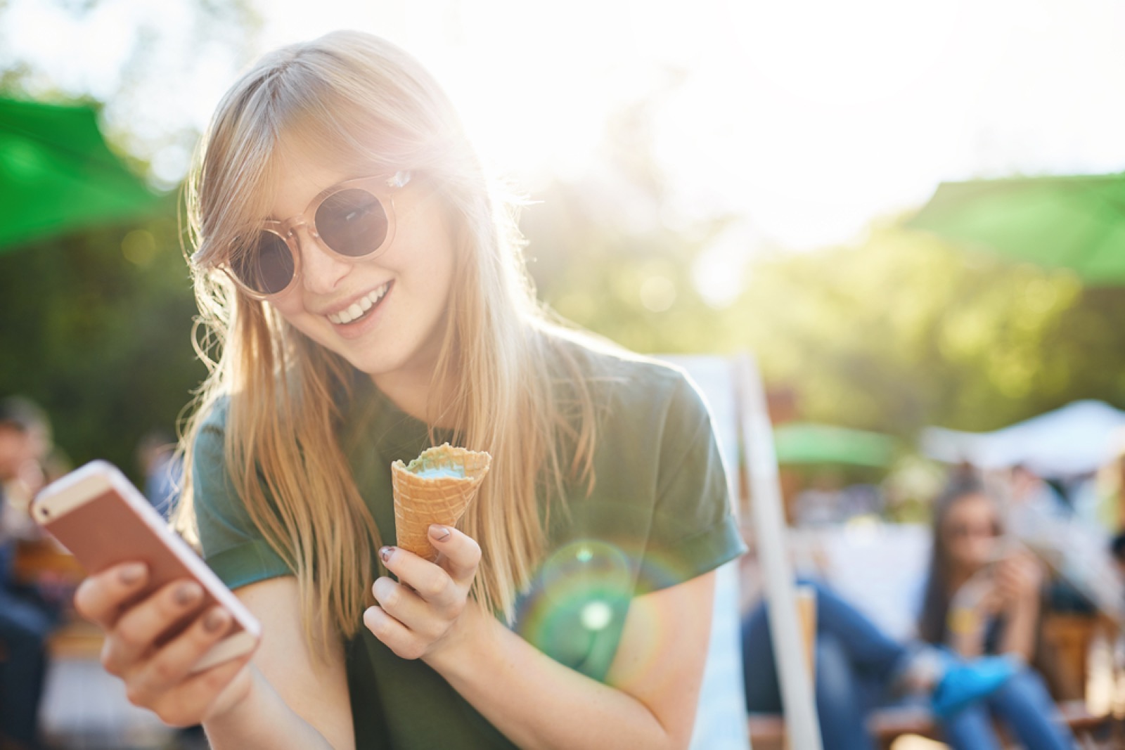Are You More of an Introvert or an Extrovert? Woman On Phone Eating Ice Cream
