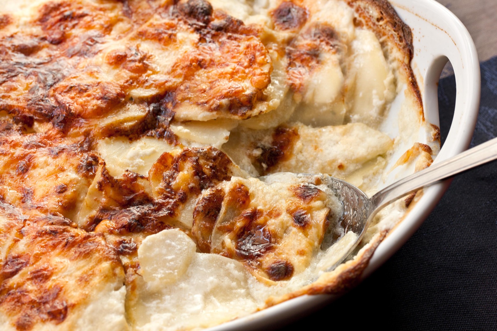 Host a Celeb Dinner Party and We’ll Guess Your Zodiac Sign Scalloped potatoes