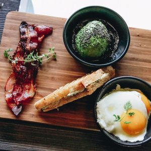 🍳 Do You Actually Prefer Classic or Trendy Breakfast Foods? On a wooden board