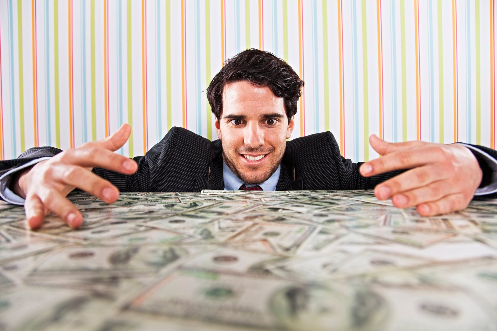 Make Some Typical Workday Choices and We’ll Reveal the Vibe You Give Off Businessman With Money
