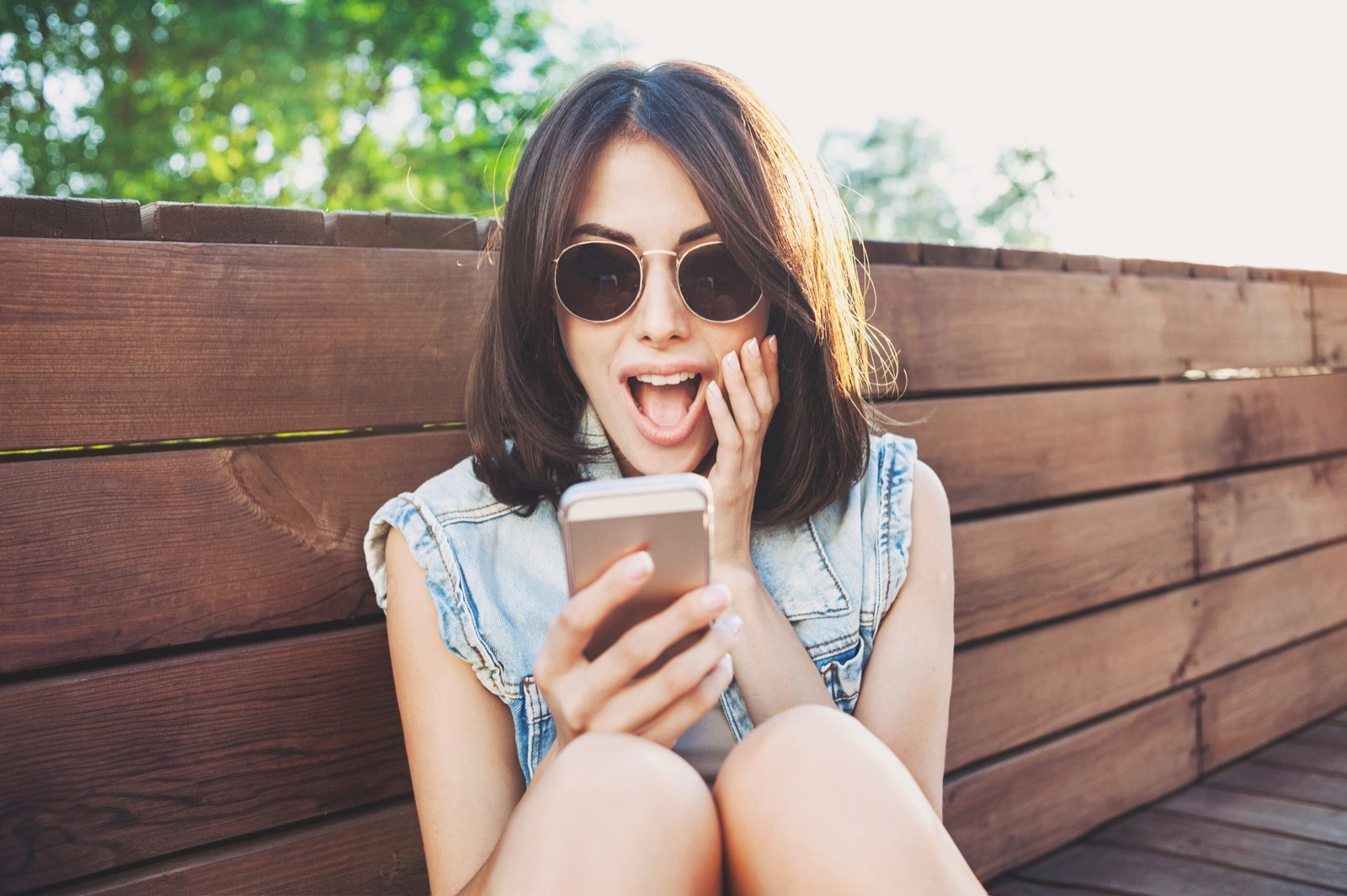 Am I Addicted To My Phone? Quiz Happy Woman Using Phone