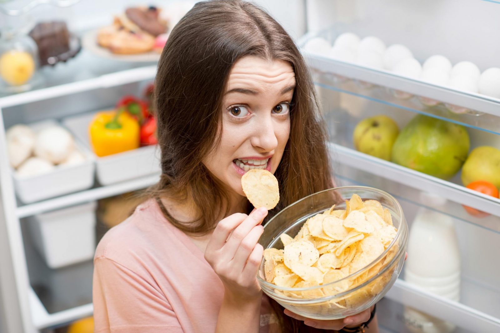 🥪 We Know What % Karen You Are Based on Your Food Preferences Woman Eating Potato Chips Snacks Refrigerator