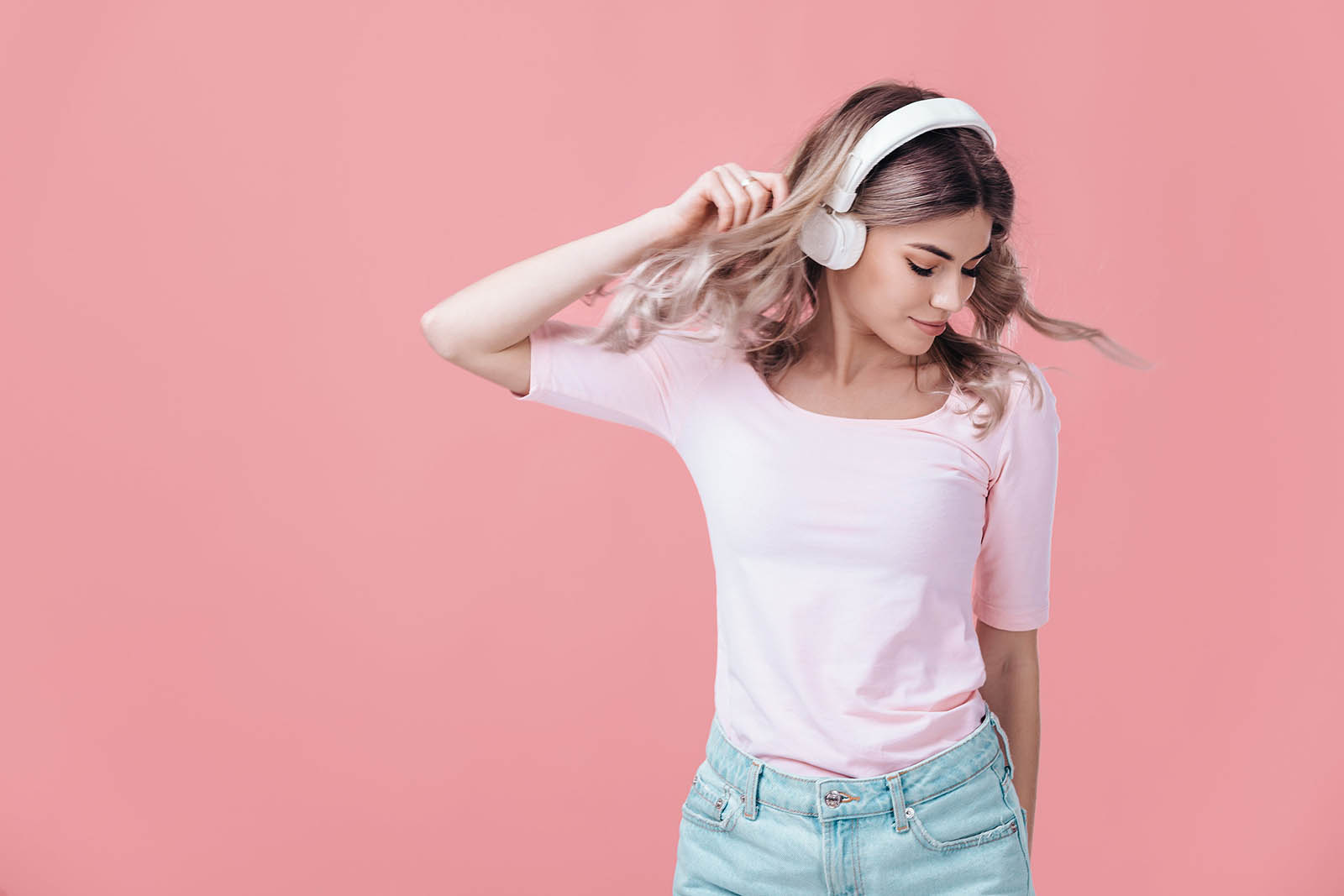 Can We Accurately Guess Your Age from Your 🛍️ Vintage Shopping Choices? Young Woman Listening To Music With Headphones On