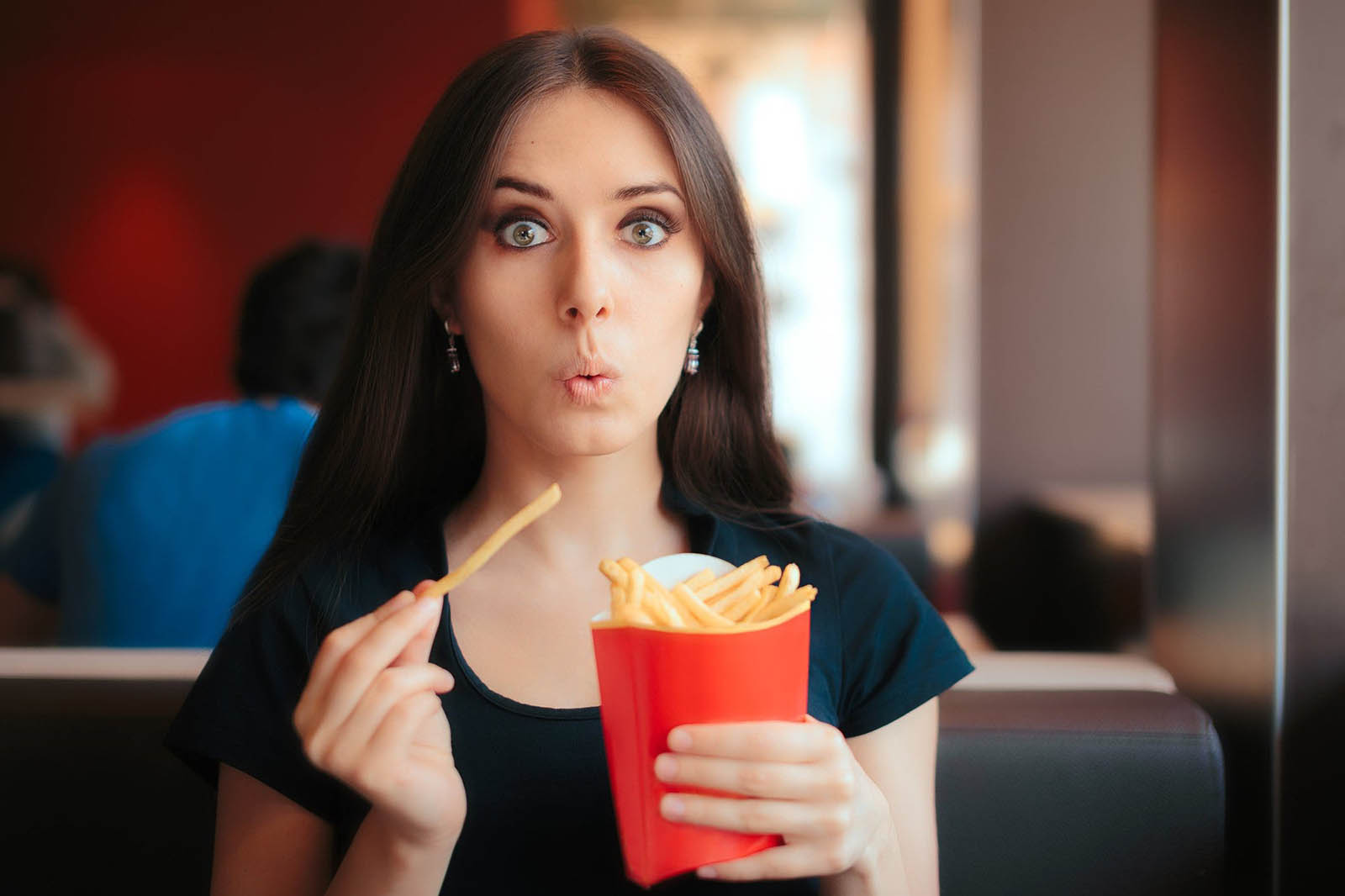 Eat Mega Meal to Know Vacation Spot You'd Feel Most at … Quiz Woman Eating Mcdonald's French Fries