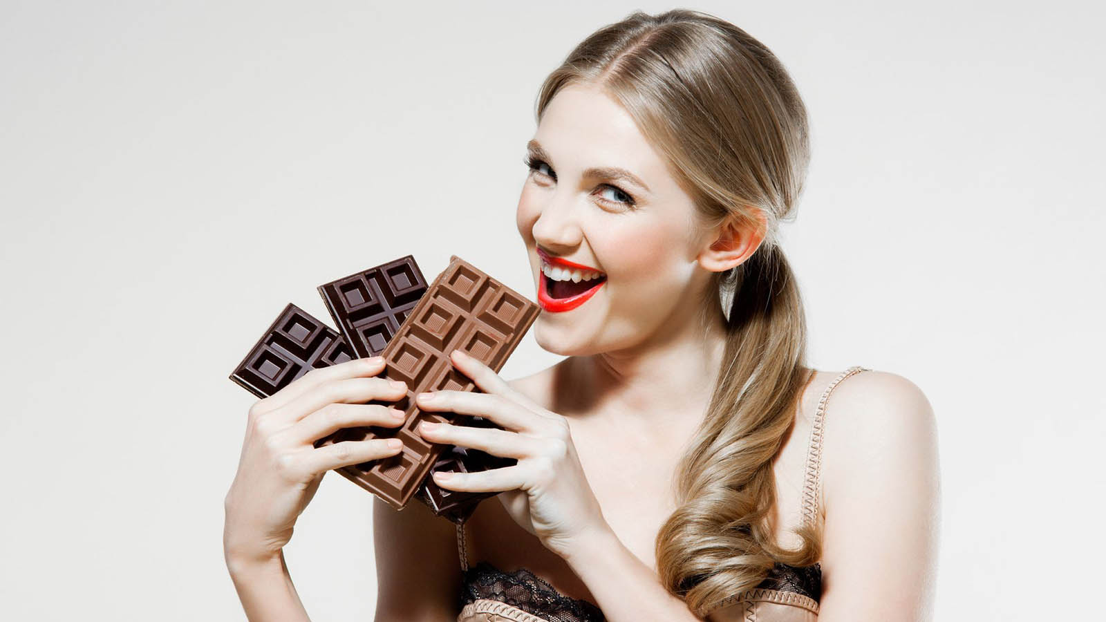 Rate These 15 Images and We Will Tell You What Your Future Looks Like Woman Eating Chocolate Bars