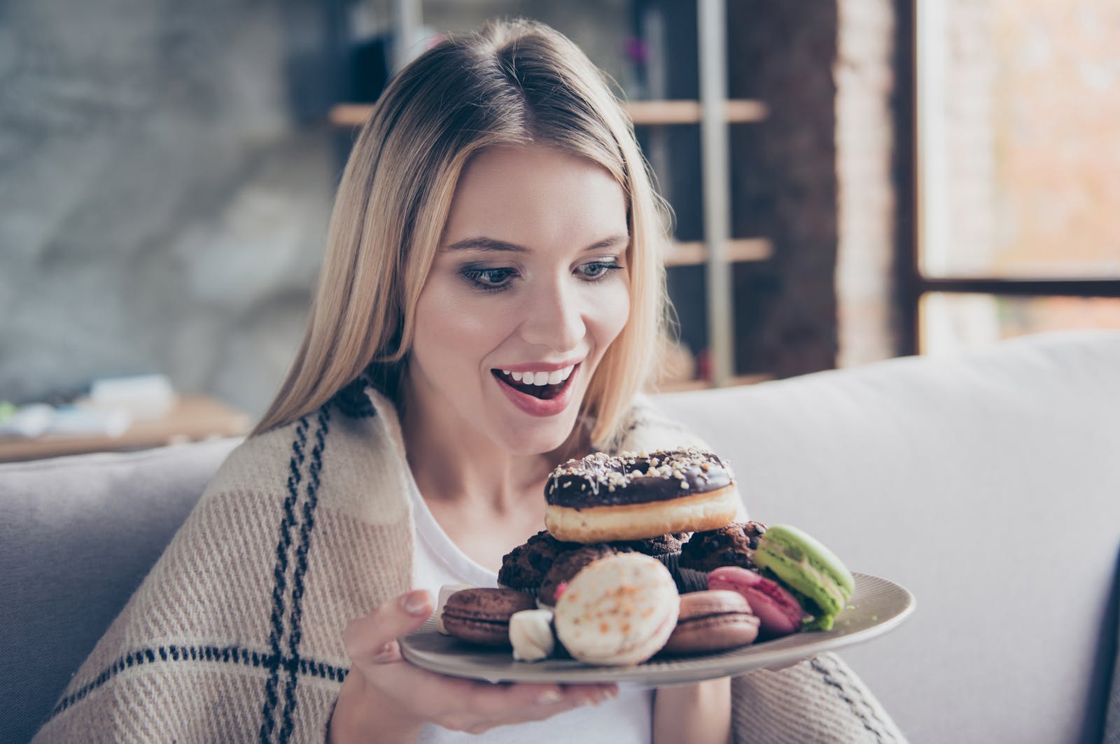 It’s Easy to Tell If You’re More American, British or Australian Just by Your Eating Habits Woman Eating Sweets Desserts Pastries Macarons Doughnuts