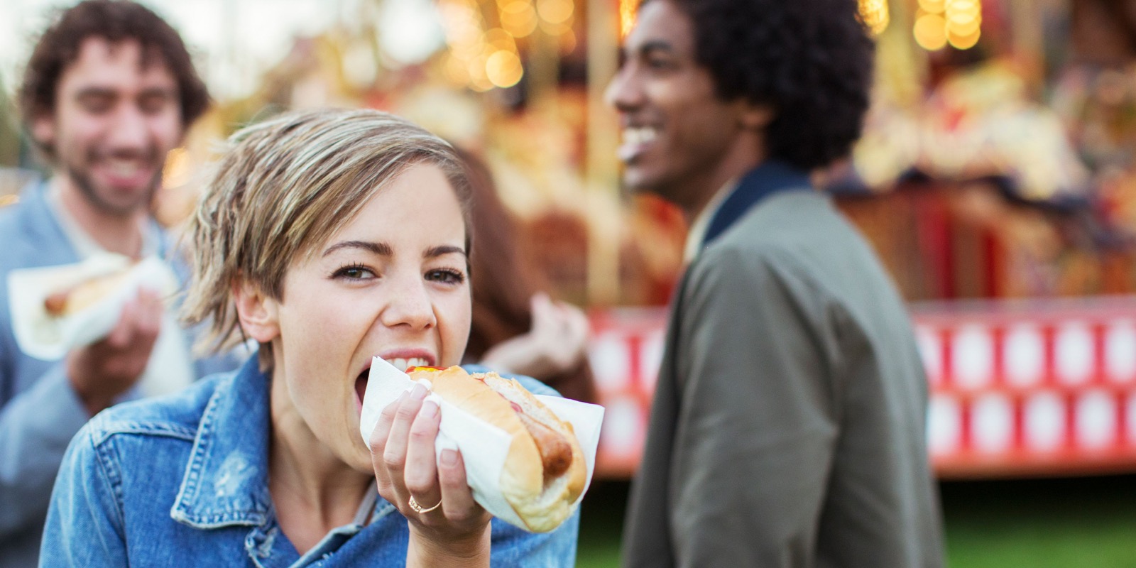 It’s Easy to Tell If You’re More American, British or Australian Just by Your Eating Habits Woman Eating Hot Dog