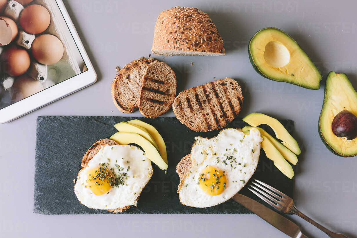 🥪 This Is a Little Odd, But We Can Actually Guess Your Age by Your Opinions on Toast Toppings Eggs With Avocado On A Slate Board