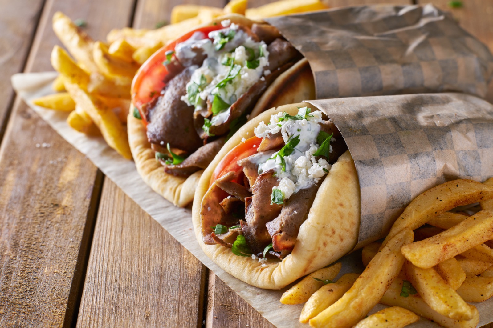 🌭 Here Are 24 Street Foods Around the World – Can You Match Them to Their Continent? Two Greek Gyros With Shaved Lamb And French Fries