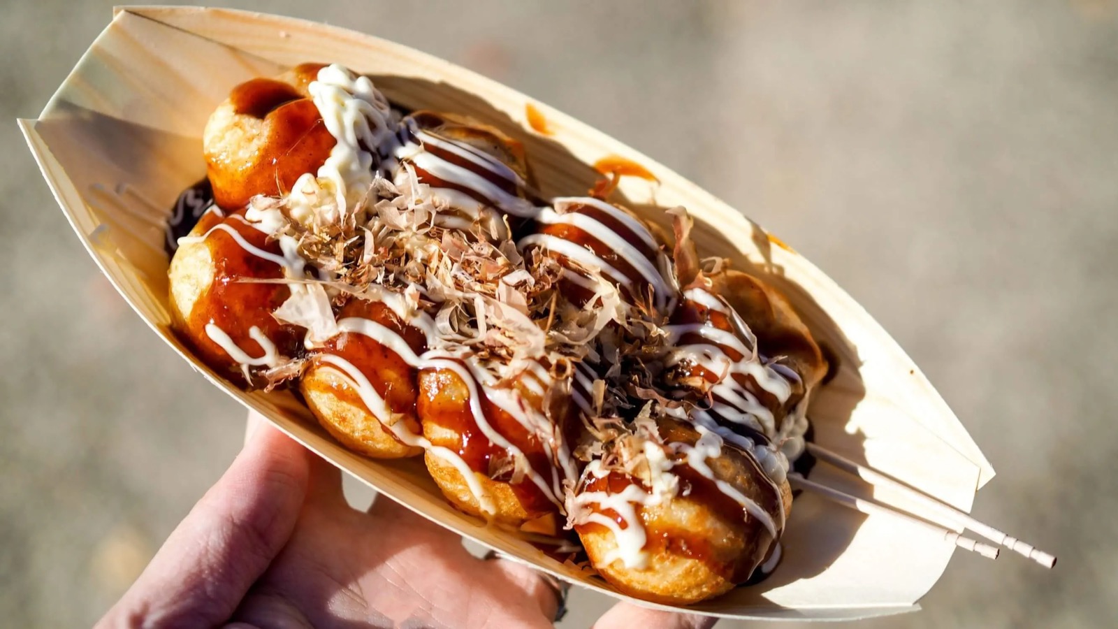 🌭 Here Are 24 Street Foods Around the World – Can You Match Them to Their Continent? Japanese Octopus Balls Takoyaki