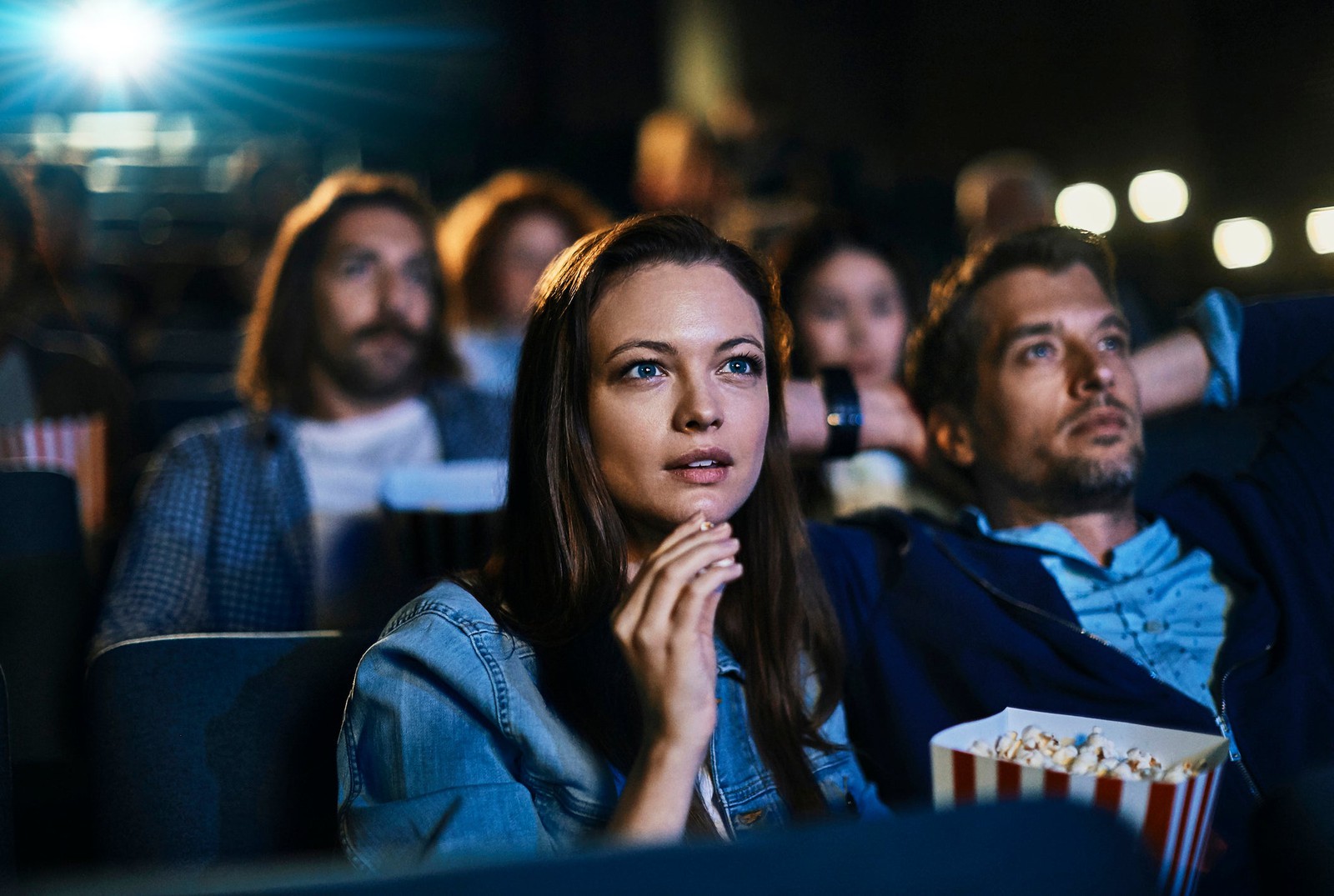 Woman Watching Movie In Cinema Theater