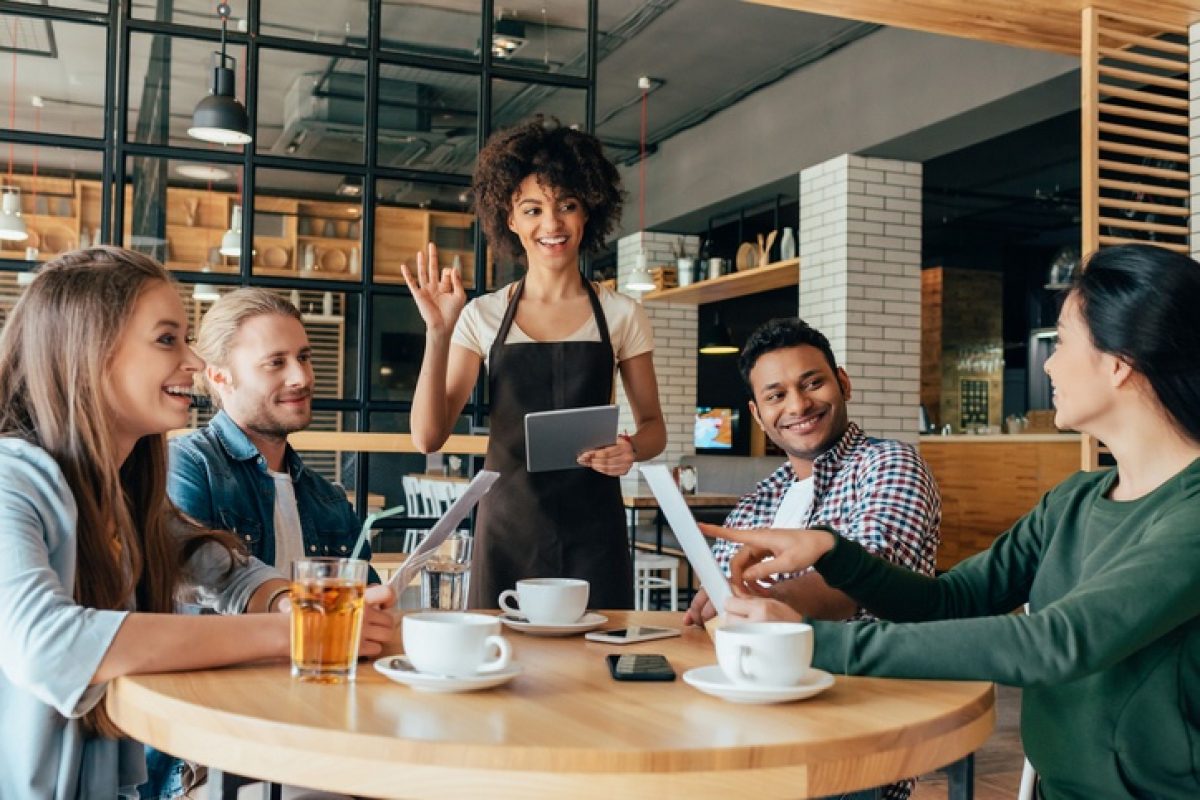 Are You American, Australian, British, Or Canadian When It Comes to Eating? Waitress Takes Order At Restaurant